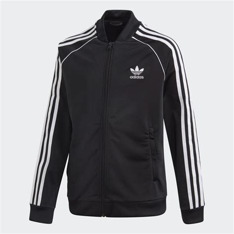 Campera sst adidas negra .